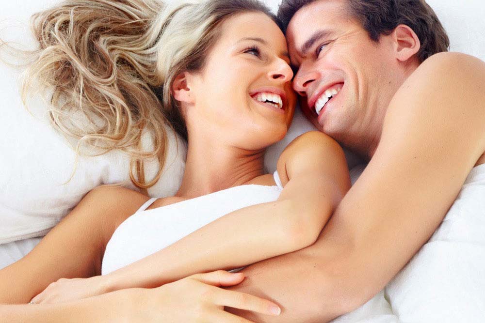 Sex Happy Couple in Bed